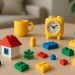 Colorful LEGO bricks scattered on a table, illustrating the significance of LEGO in everyday life